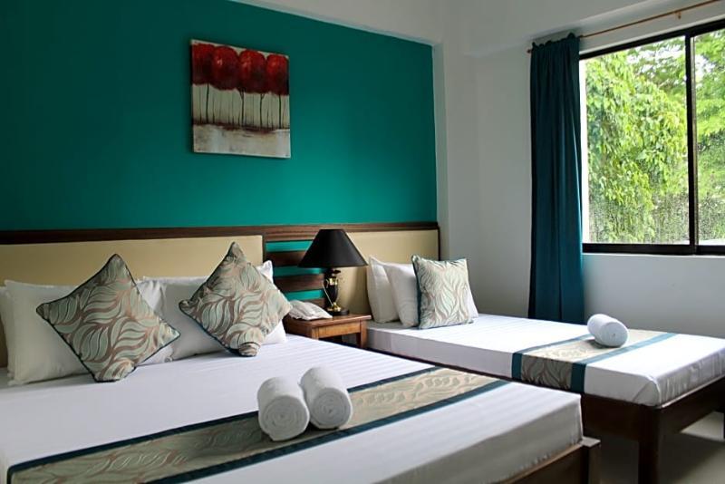 เรดดอร์ซ พลัส เนียร์ ริซัล จังค์ชั่น Hotel Puerto Princesa ภายนอก รูปภาพ
