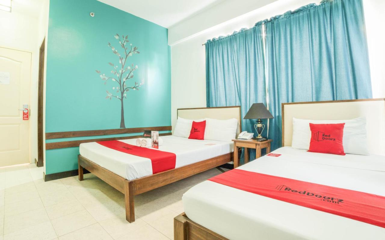 เรดดอร์ซ พลัส เนียร์ ริซัล จังค์ชั่น Hotel Puerto Princesa ภายนอก รูปภาพ
